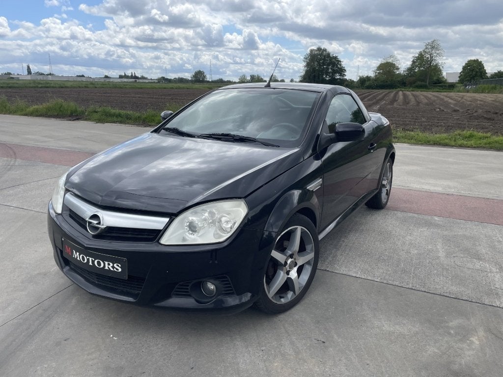 Opel Tigra 1.4 Benzine 143 000 km *2008*, Auto's, Opel, Voorwielaandrijving, Lederen bekleding, Leder, Bedrijf