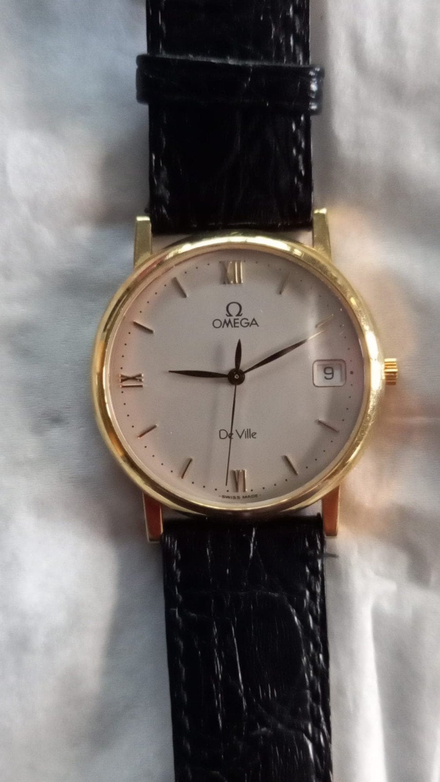 Gouden horloge Omega Deville, Ophalen