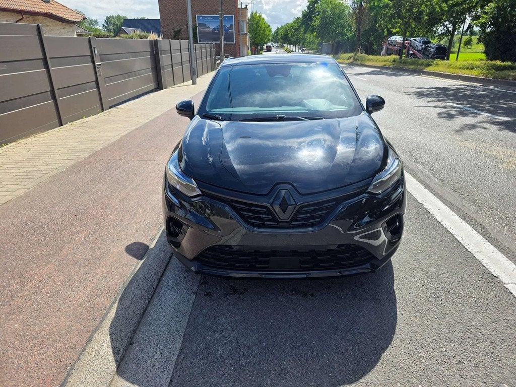 Renault Captur 1.6i E-TECH Hybride MHVE Black Edition AUT. 2, Auto's, Gebruikt, 4 cilinders, Zwart, Bedrijf