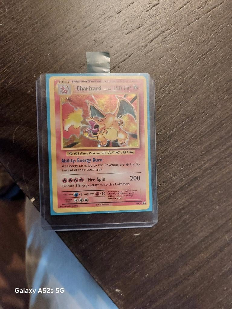 Charizard 11/108 evolutions goeie conditie, Hobby en Vrije tijd, Ophalen of Verzenden, Zo goed als nieuw, Losse kaart