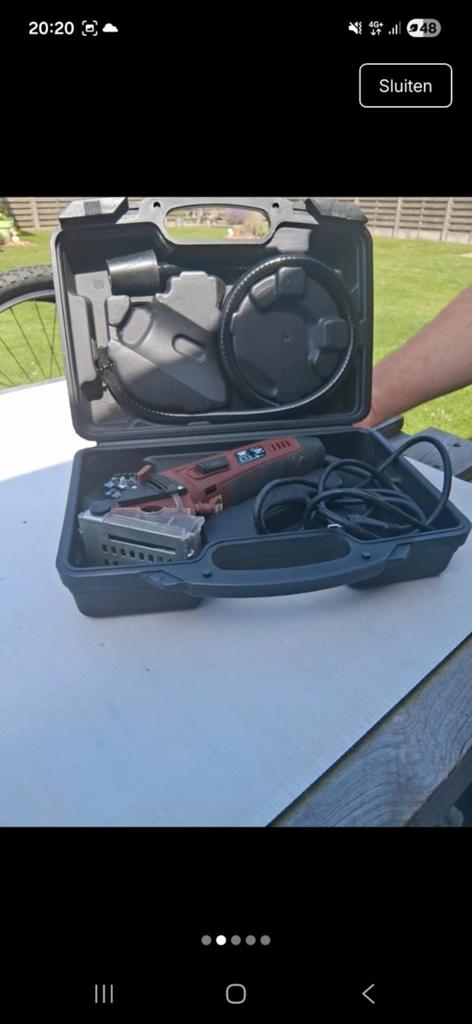 Slijpmachine 'Rotorazer' met verschillende bladen, Ophalen