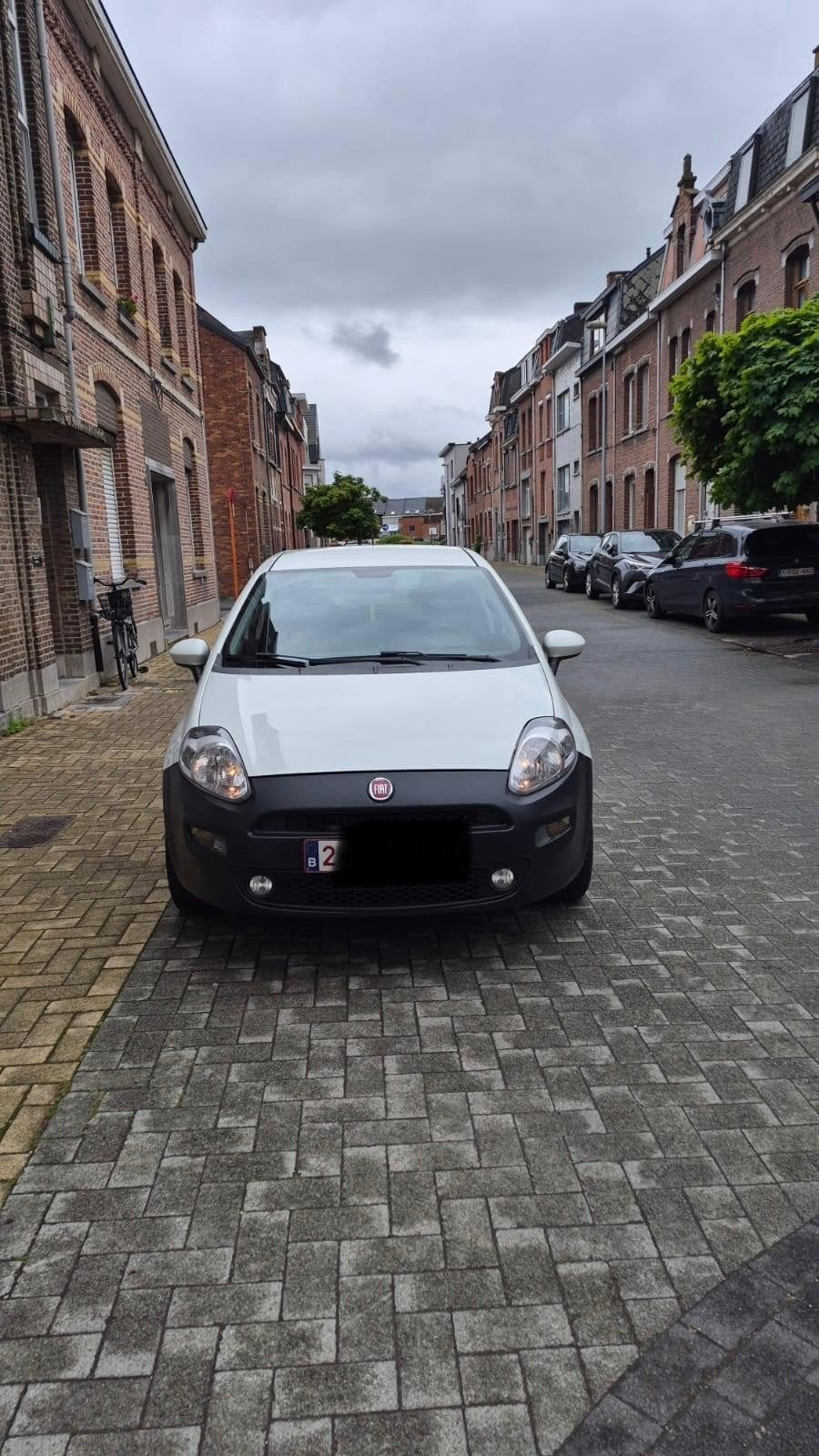 Fiat punto 2015 proper 1.2 motor lage kilometerstand, Auto's, Euro 5, Wit, Handgeschakeld, 5 deurs