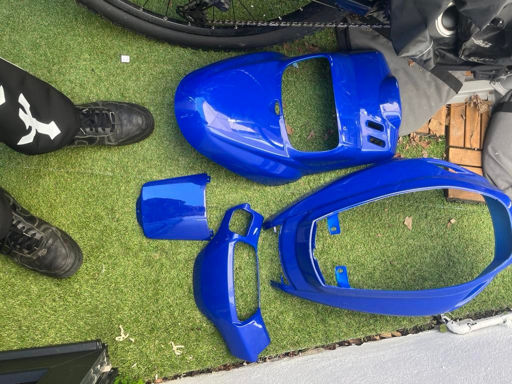Blauwe mbk booster kappen, Ophalen