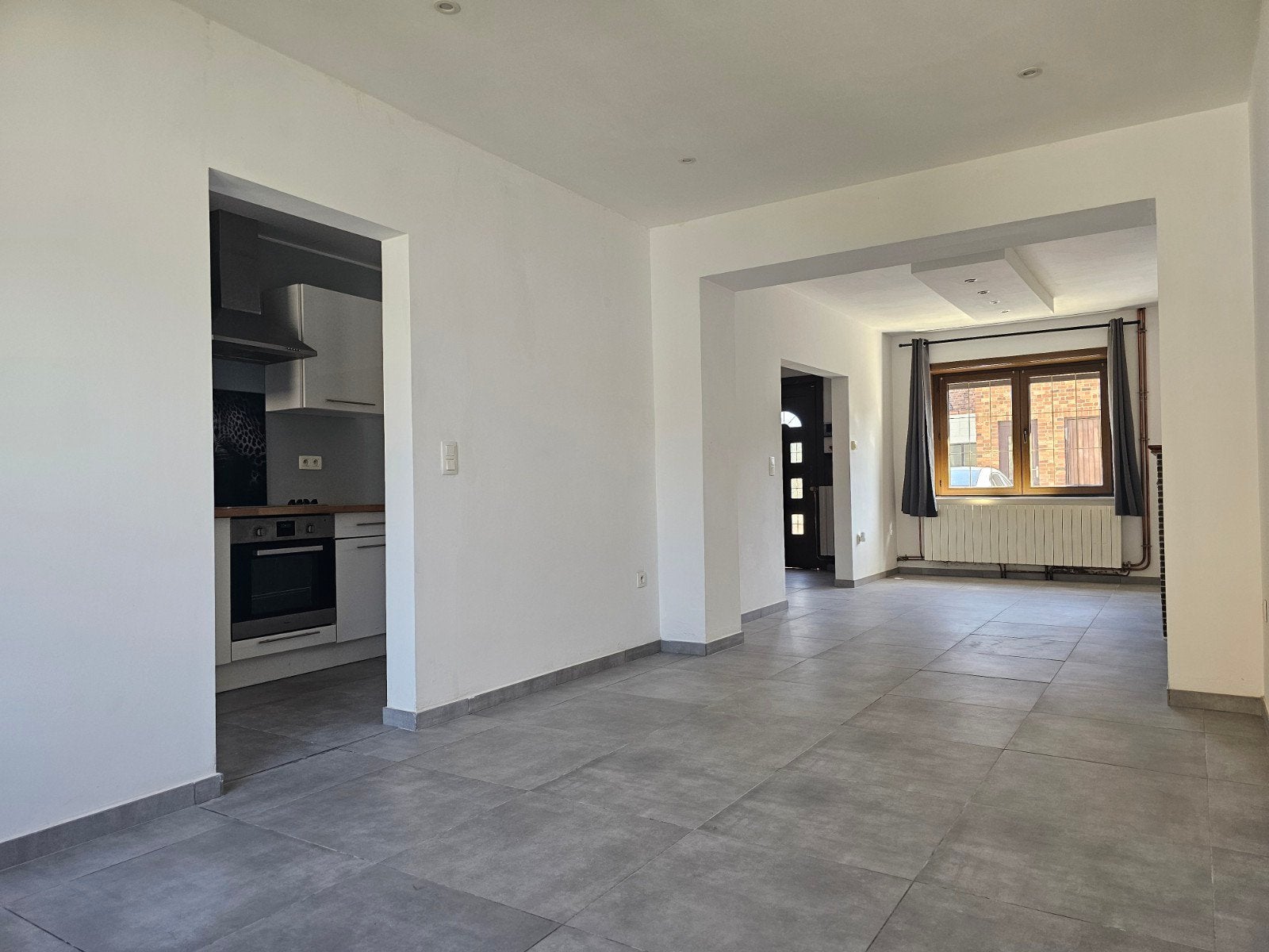 Maison 2 chambres avec garage et jardinet à Lodelinsart, Immo, Huizen te huur