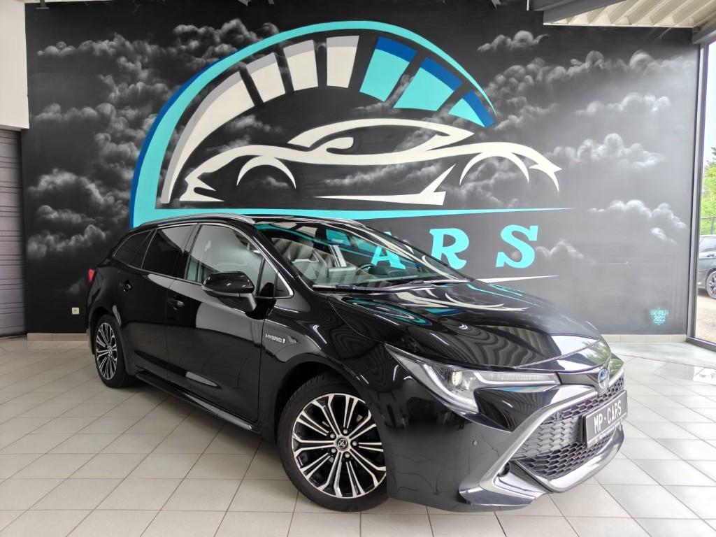 Toyota Corolla Corolla SW Hybrid 1.8 Premium e-CVT, Auto's, Toyota, Zwart, Break, 5 deurs, Parkeerassistent