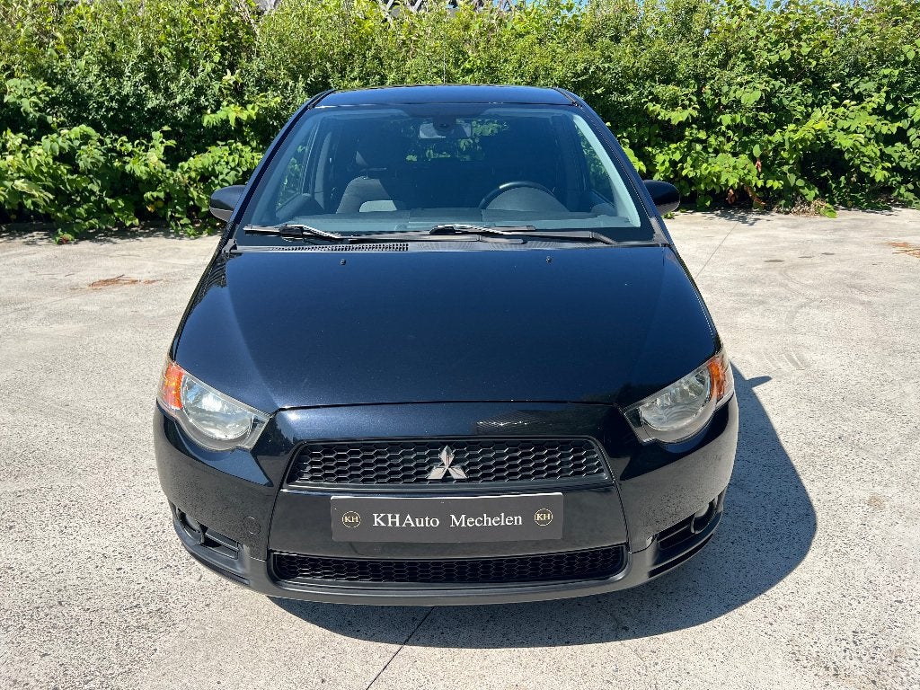 Mitsubishi Colt 1.3i 95pk Automaat Airco Cruise C. Garantie, Auto's, Automaat, Dealer onderhouden, Stof, https://public.car-pass.be/vhr/c1603066-fa52-434f-8d72-5bf3d7faac99