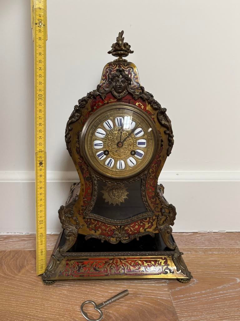 Antieke Boulle klok, Ophalen