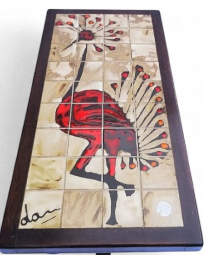 Salontafel met gekroonde kraanvogelmotief gesigneerd Dan, Enlèvement