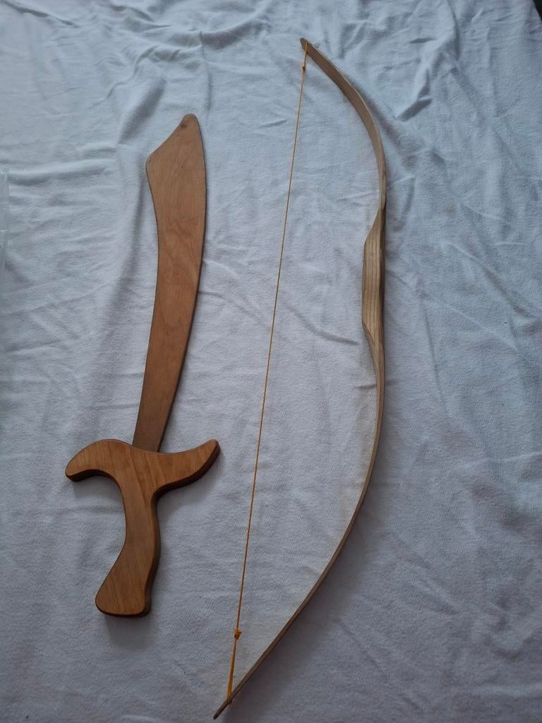 Houten boog en zwaard, Ophalen