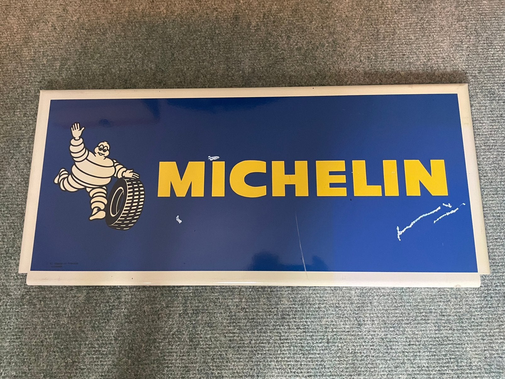 Michelin Bibendum metalen plaat, Ophalen