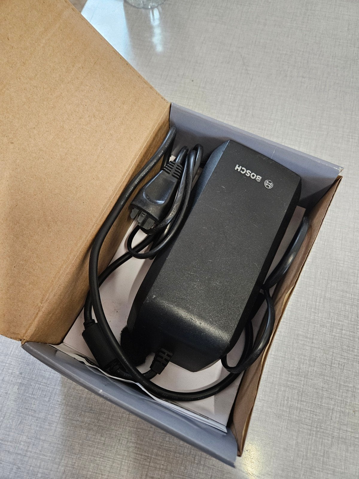 Bosch fiets oplader 4A, Fietsen en Brommers