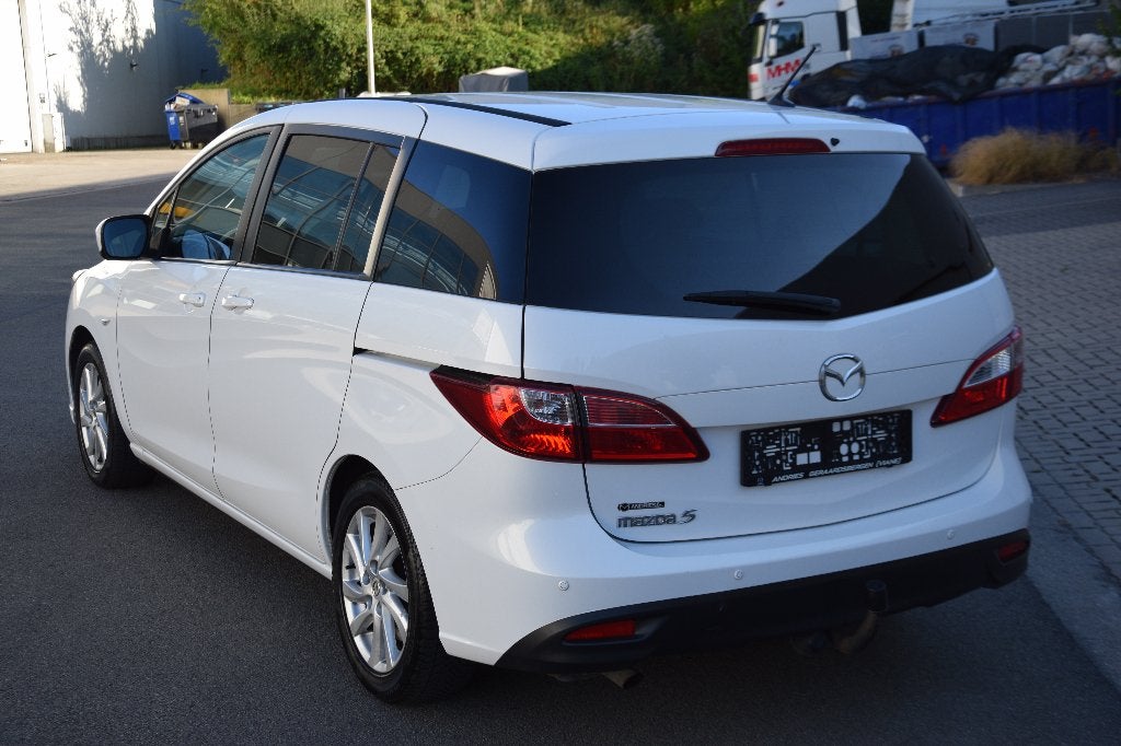 Mazda 5 1.8i Active 7pl, https://public.car-pass.be/vhr/8550c335-7a36-49ae-8439-cc005aad8905, Zwart, Bedrijf, Handgeschakeld