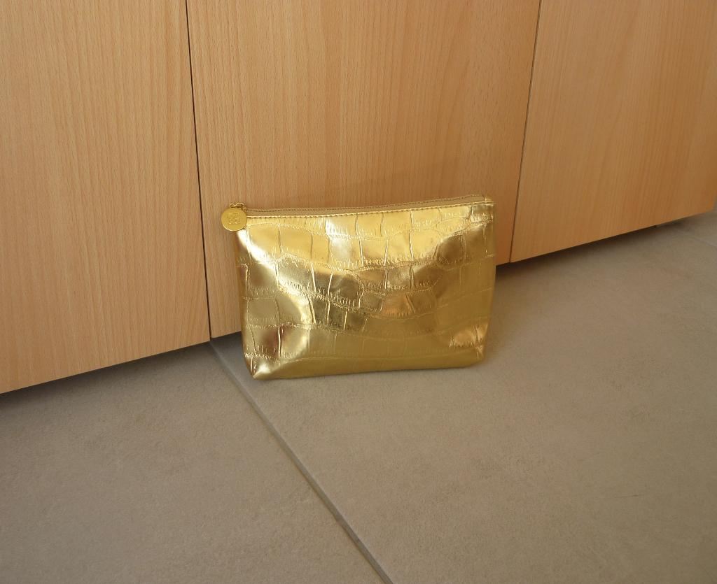 Goudkleurige toilettas makeuptas van Estee Lauder, Ophalen of Verzenden