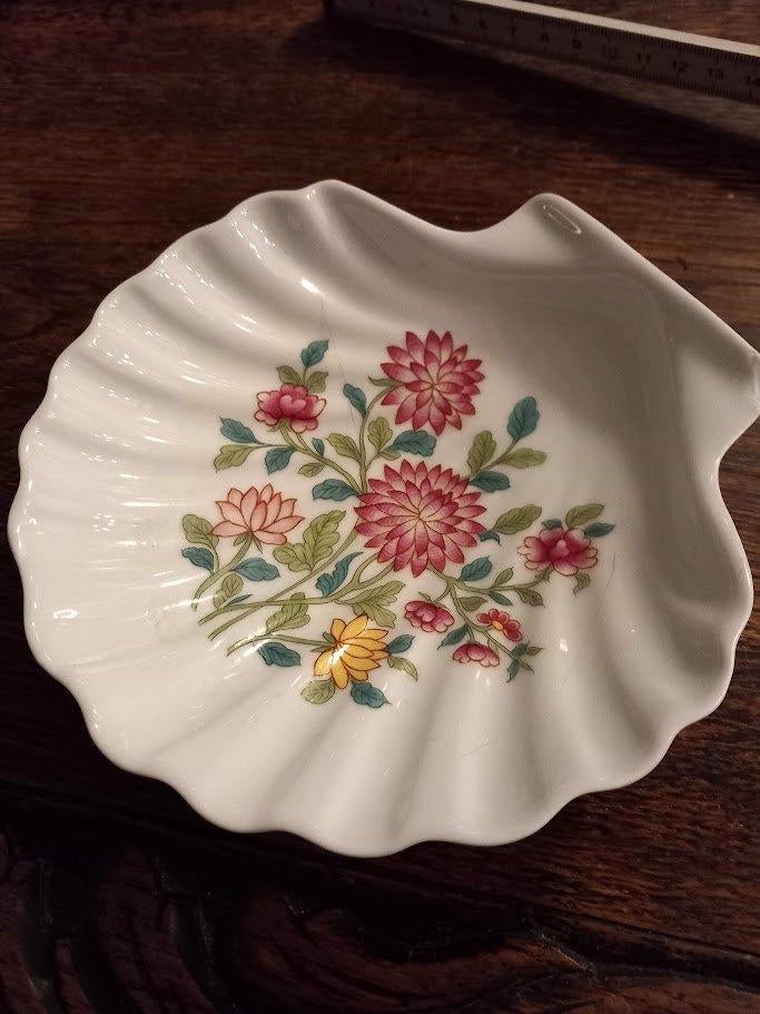 porseleinen schelp, Ophalen