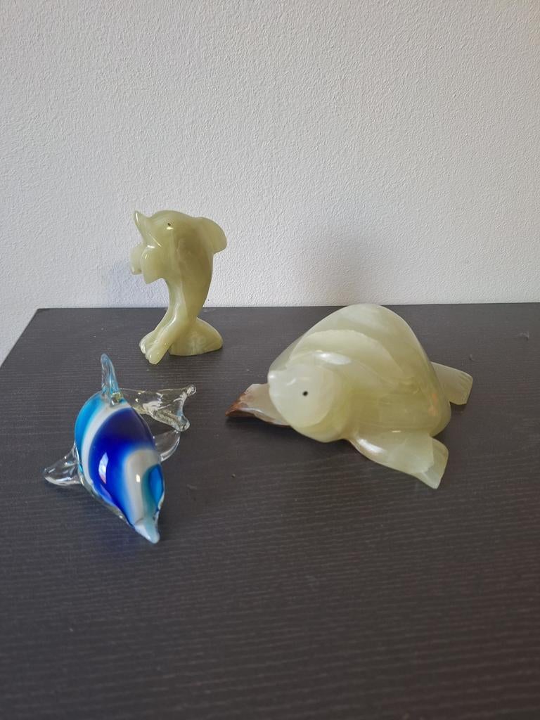 Beeldjes schildpad en dolfijn, Ophalen