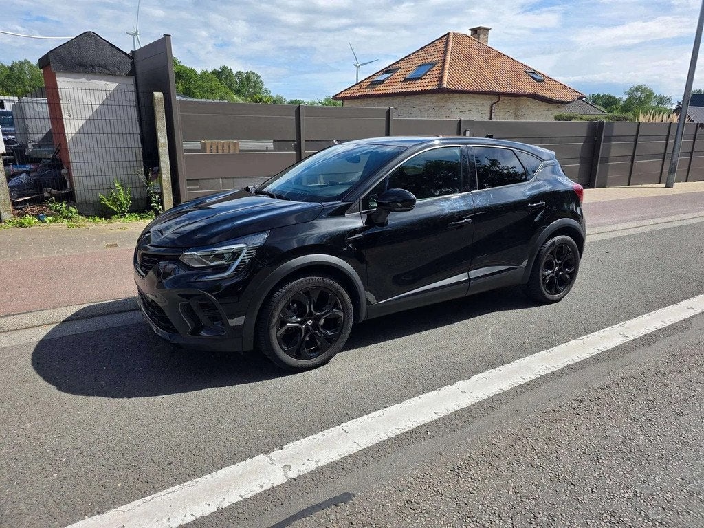 Renault Captur 1.6i E-TECH Hybride MHVE Black Edition AUT. 2, Auto's, Gebruikt, 4 cilinders, Zwart, Bedrijf