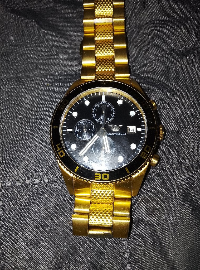 Montre Armani comme neuf, Handtassen en Accessoires, Polshorloge, Ophalen of Verzenden, Zo goed als nieuw, Overige materialen