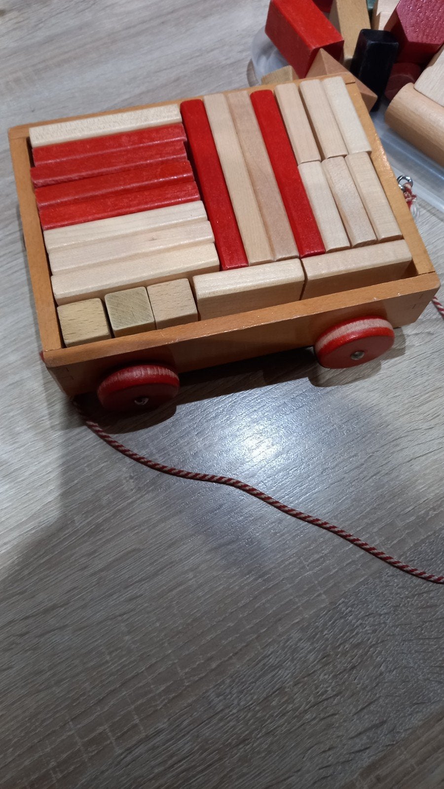 Blokken karretje, Ophalen