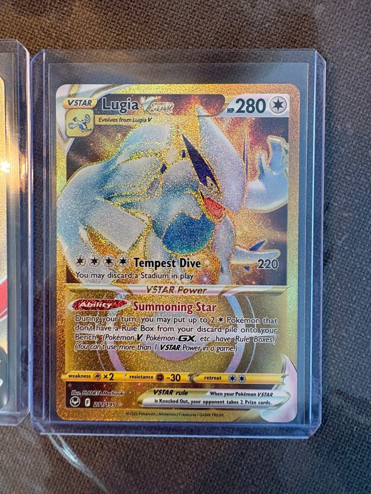 Lugia VSTAR 211/195 - Silver Tempest - Pokémon, Ophalen of Verzenden, Zo goed als nieuw