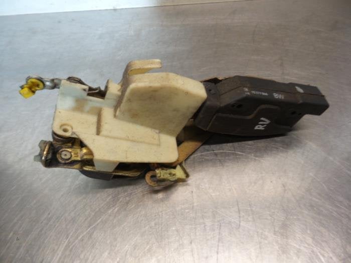Serrure portière mécanique 2portes droite d'un Opel Calibr, -, Opel, 3 mois de garantie, Utilisé
