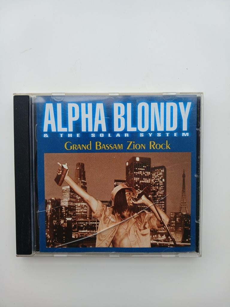 Alpha blondy grand bassam zion rock cd, Cd's en Dvd's, Cd's | Reggae en Ska, Ophalen of Verzenden, Gebruikt