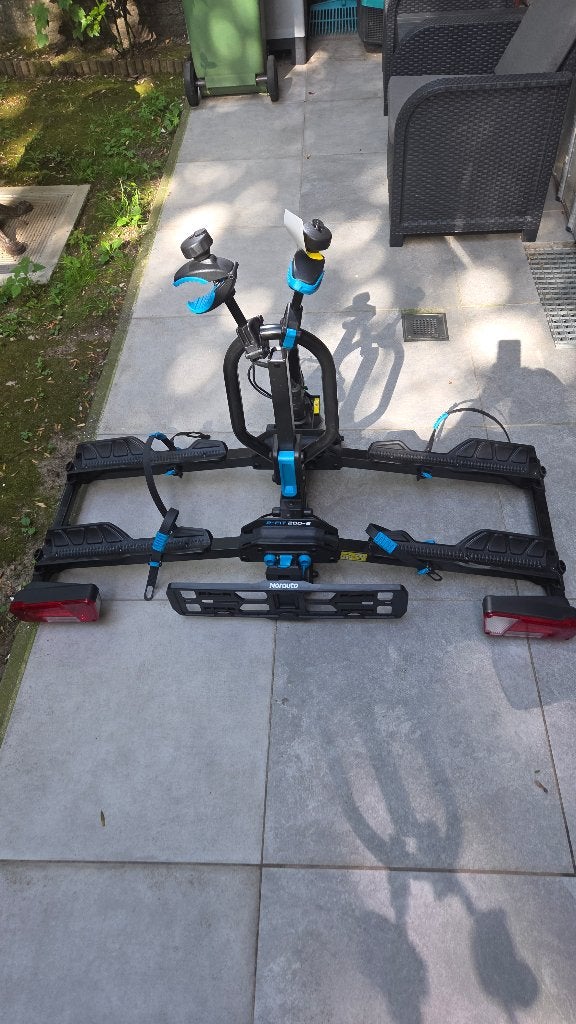 Porter un vélo, Enlèvement, Comme neuf