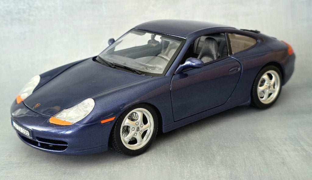 Burago 1/18 - Porsche 911 Carrera 1997 (Type 996), Hobby & Loisirs créatifs, Voitures miniatures | 1:18, Envoi, Comme neuf, Voiture