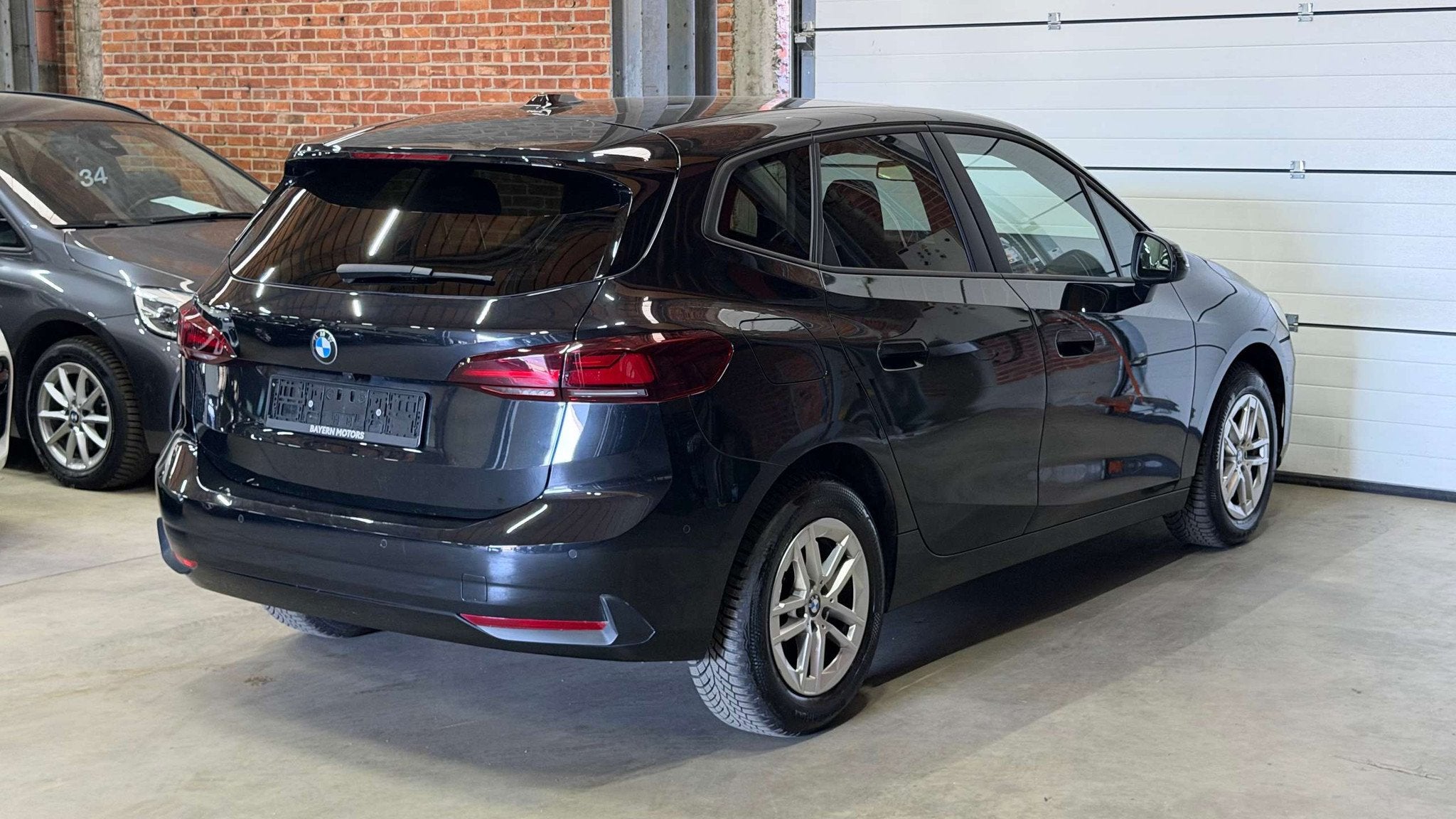 BMW 216 iA Garantie Active Tourer Benzine Automaat, Autos, BMW, Achat, Euro 6, Carnet d'entretien, Noir