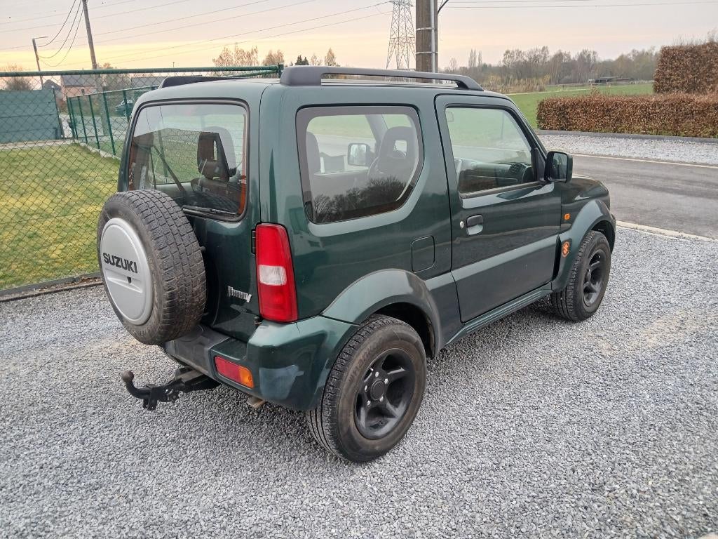 Suzuki jimny #76 000km# 1300cc benzine !!4x4!! Airco, Auto's, Suzuki, 4 zetels, Stof, Bedrijf, Handgeschakeld