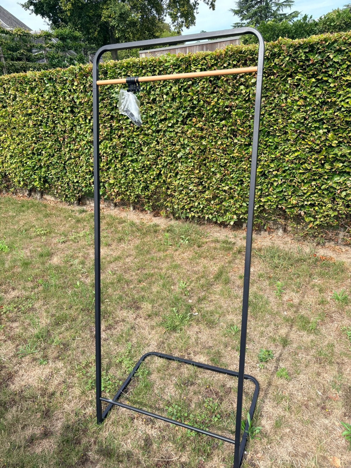 Kledingrek met haken, Ophalen, Zo goed als nieuw