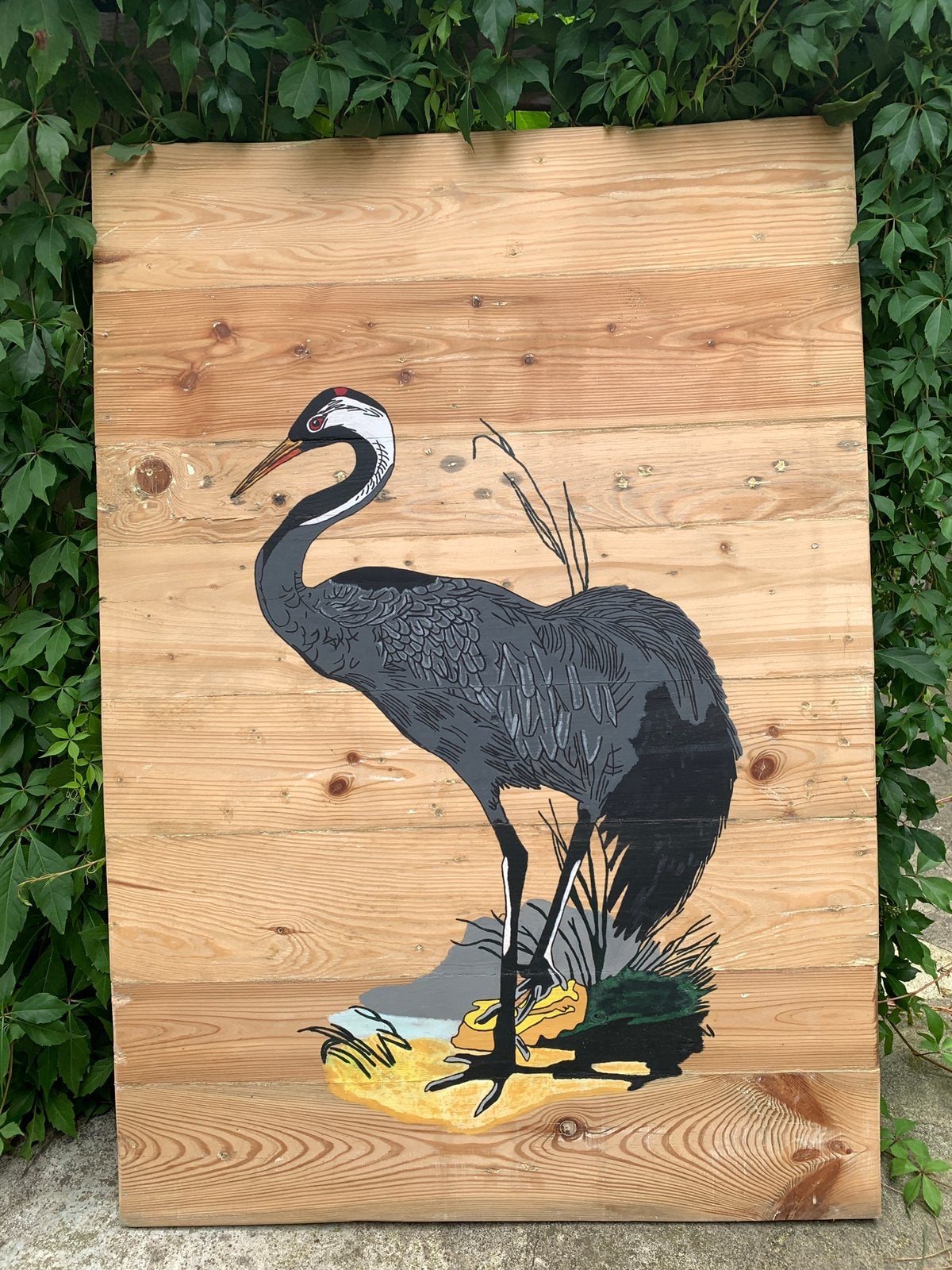 Kraanvogel handgeschilderd op hout, Ophalen