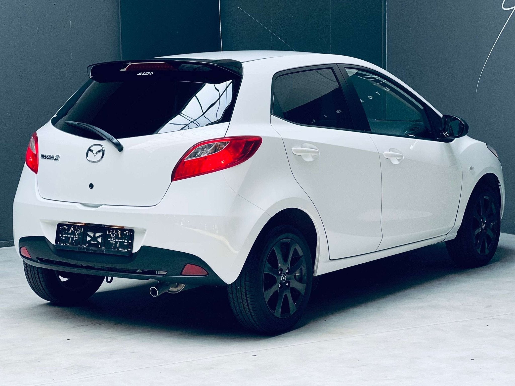 Mazda 2 1.3i *CLIMATISATION*GARANTIE* (bj 2014), Auto's, Voorwielaandrijving, Euro 5, Stof, Zwart