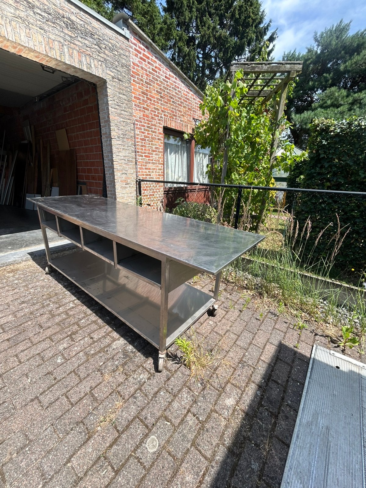 Professionele RVS werktafel op wielen, Ophalen