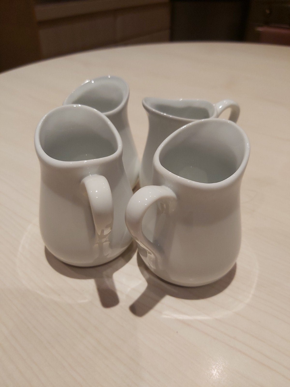 4 kleine melkkannetjes, Ophalen