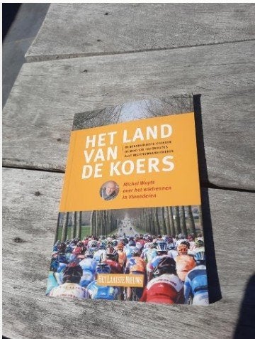 Het Land van de Koers - Michel Wuyts, Ophalen of Verzenden, Zo goed als nieuw, Lopen en Fietsen