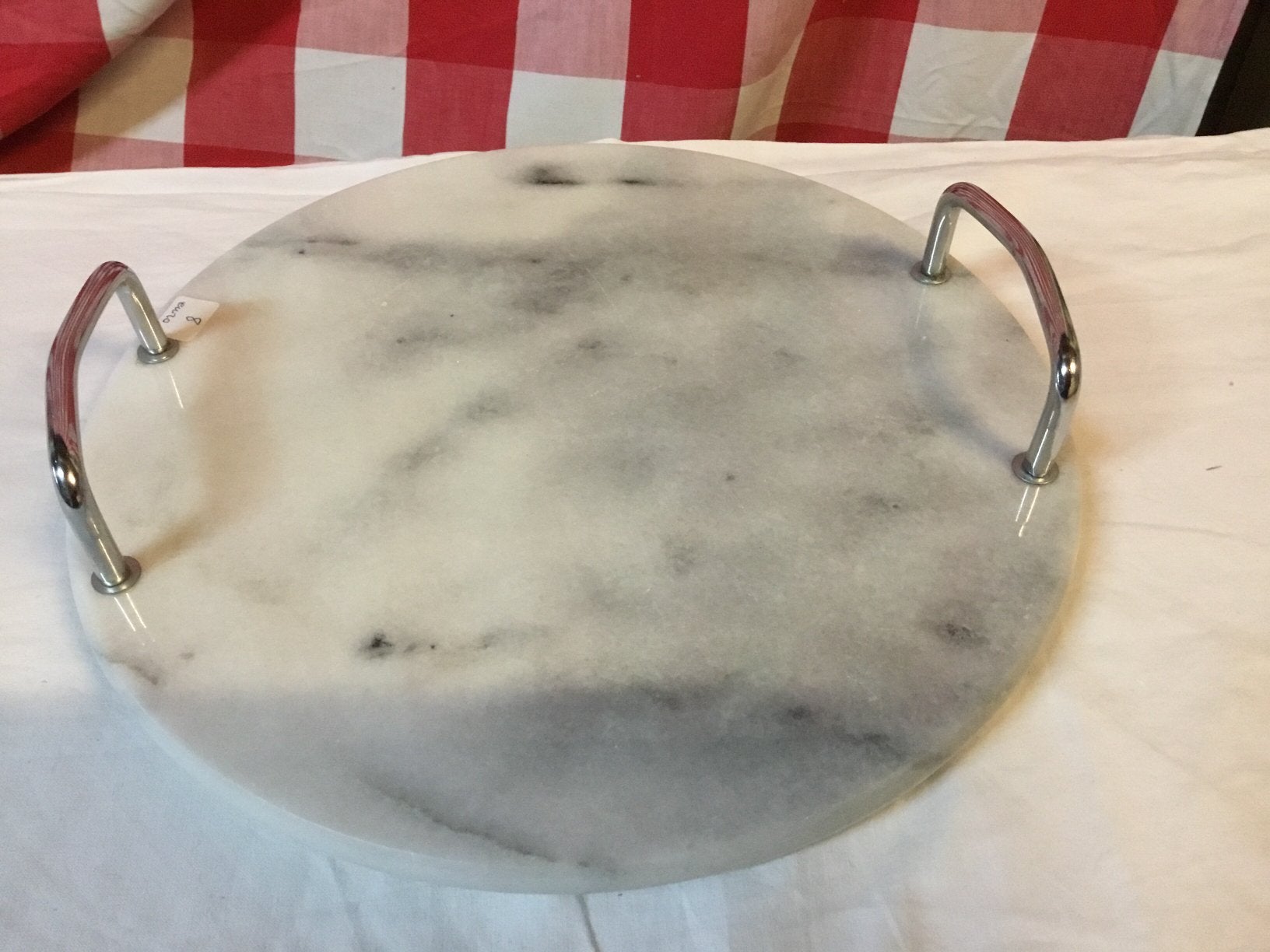 Marmeren schotel met twee handvatten, Ophalen