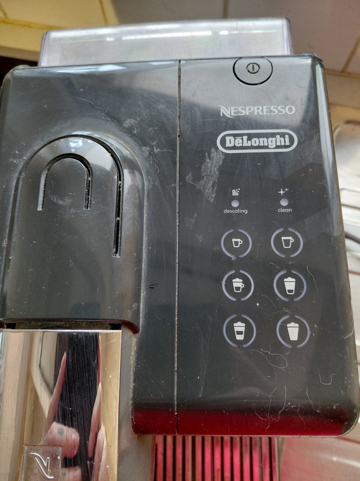 nespresso delonghi, Ophalen