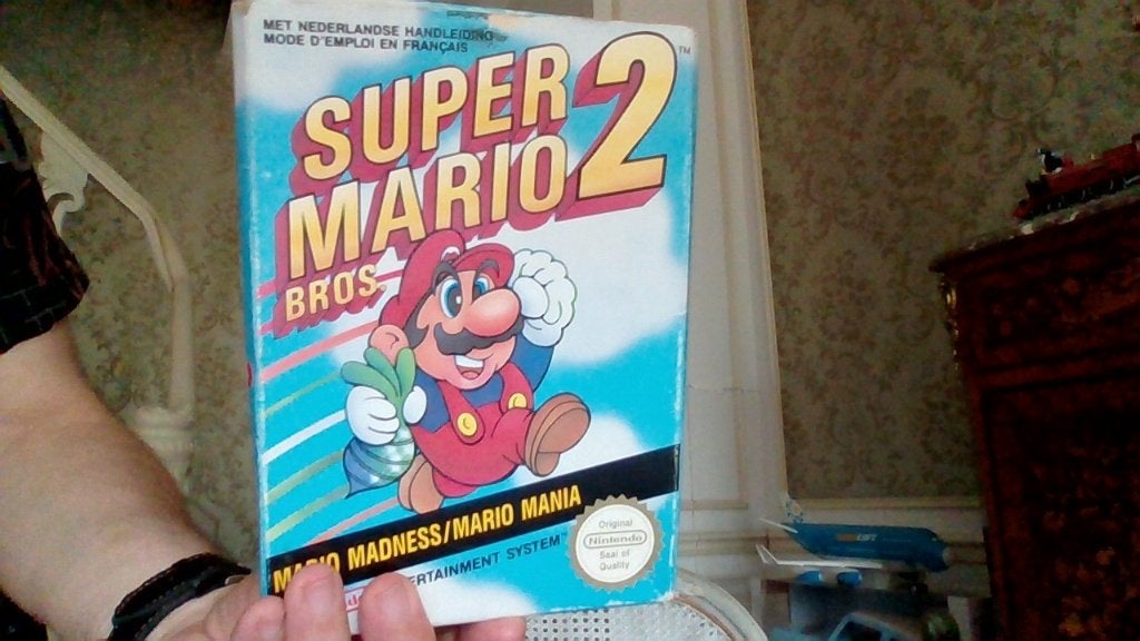 Jeu super mario bros nes  avec la boite et le fourreau, Enlèvement