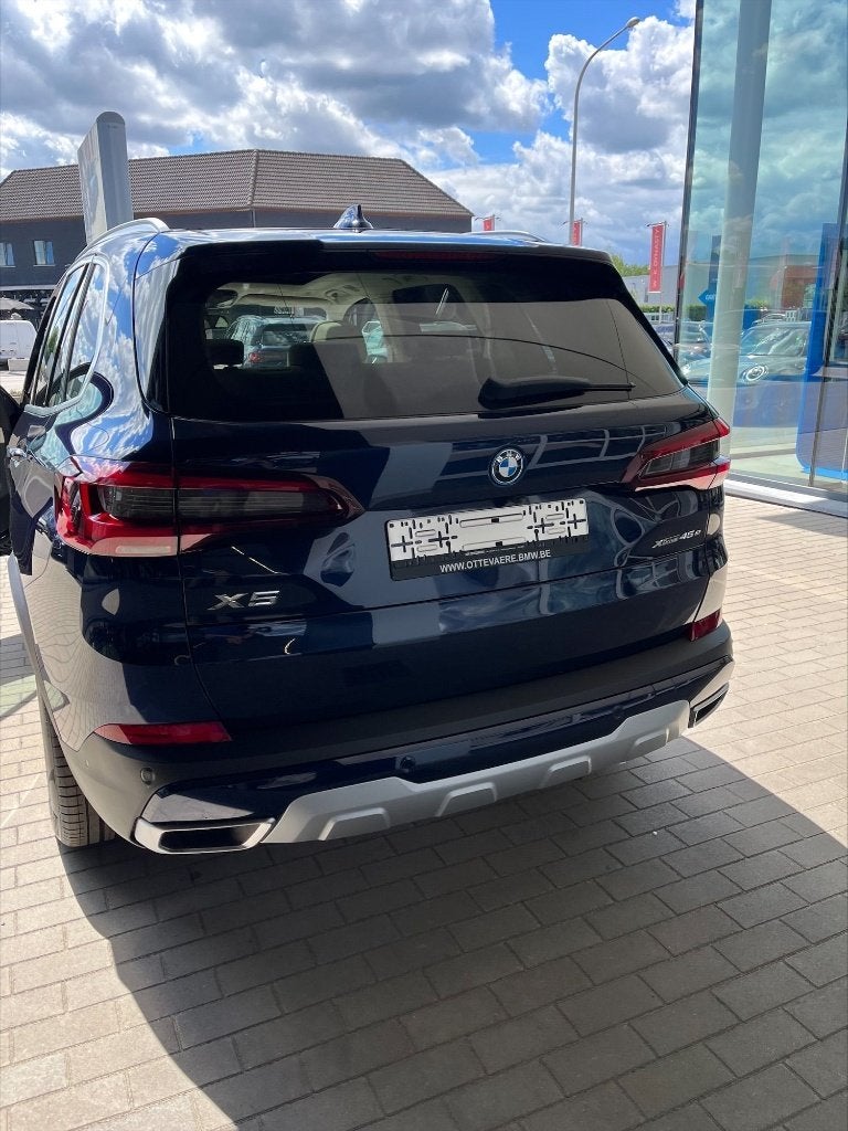 BMW X5 xDrive45e Individual, Auto's, Automaat, Verwarmde buitenspiegels, Blauw, Leder