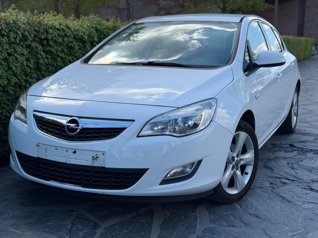 Opel Astra 1.4Benzine/133.000km's/Garantie, Auto's, Voorwielaandrijving, 4 cilinders, Leder en Stof, Wit