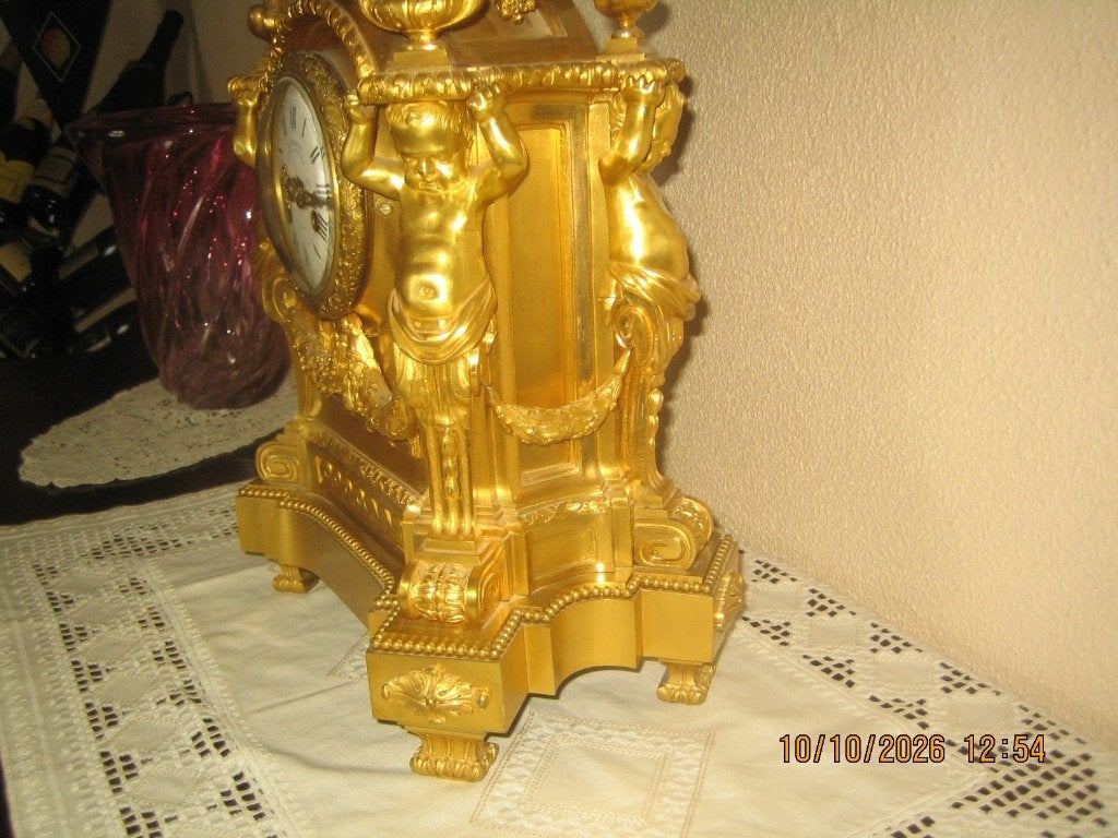 pendule bronze dore, Enlèvement