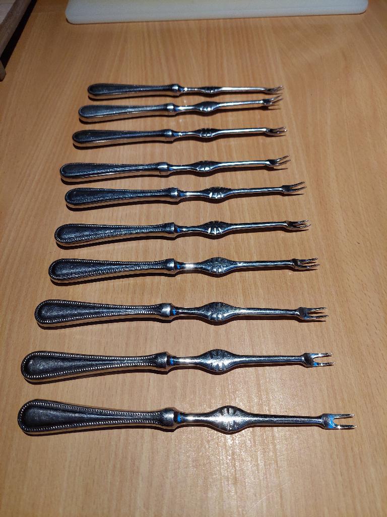 10 kreeftenhaakjes / krabhaakjes in inox, Ophalen of Verzenden, Zo goed als nieuw, Los bestek, Inox of Chroom