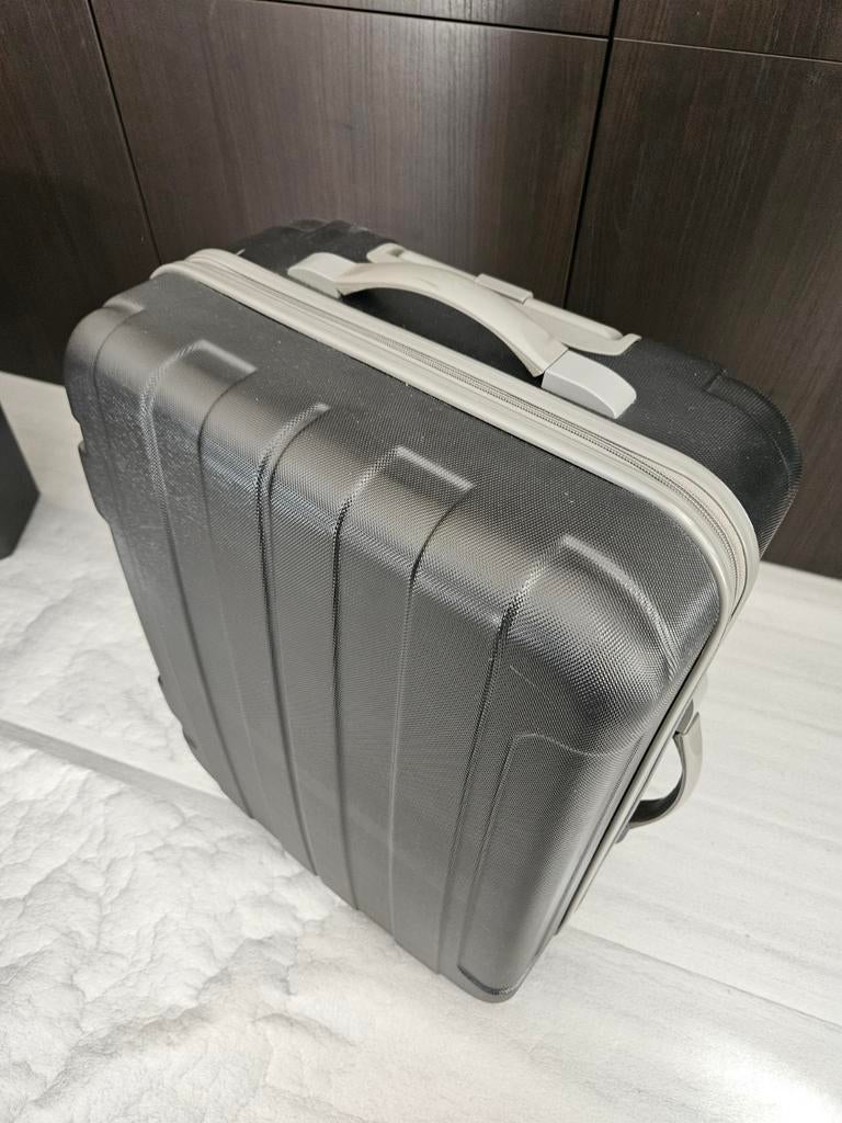 Koffer handbagage., Ophalen