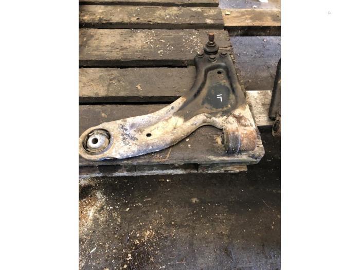 Draagarm links-voor van een Opel Corsa, Ophalen of Verzenden, 3 maanden garantie, Gebruikt, Opel