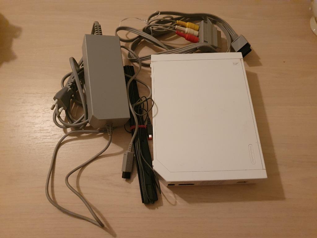 console Wii-console + Wii-sportspel, Enlèvement ou Envoi, Comme neuf, Avec jeux