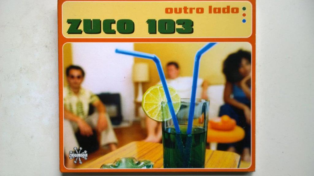 Zuco 103 - Outro Lado, Envoi, Comme neuf