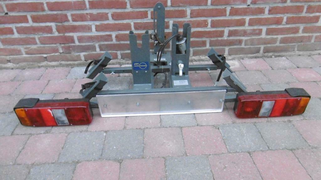 Fietsendrager, Ophalen, Zo goed als nieuw