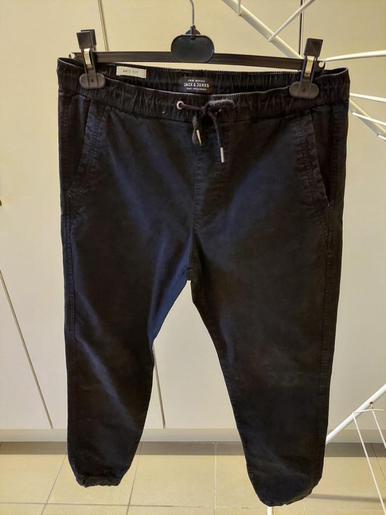 Zwarte lange broek met rekker boven- en onderaan, Kleding | Heren, Broeken en Pantalons, Ophalen of Verzenden, Gedragen, Zwart