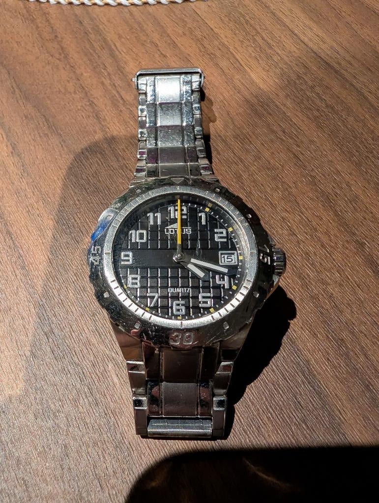 Lotus horloge, Handtassen en Accessoires, Horloges | Heren, Overige merken, Staal, Gebruikt, Staal