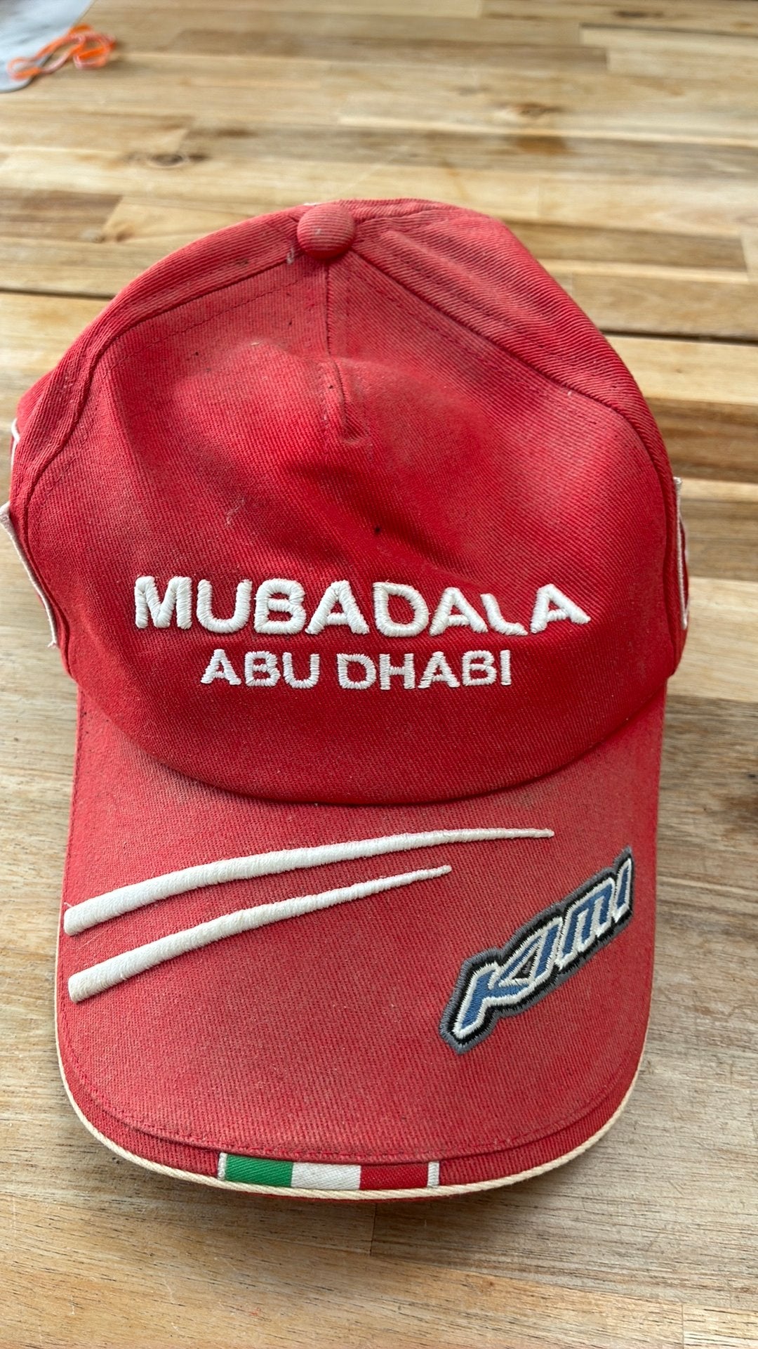 Ferrari F1 Michael Schumacher nr. 4 pet – Mubadala Abu Dhabi, Hobby en Vrije tijd, Ophalen of Verzenden, Gebruikt